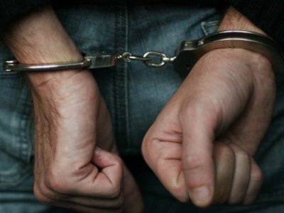 Police arrest with handcuffs