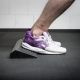 Hard solid rubber squat ramp, allowing heel elevation in the squat exercise. 